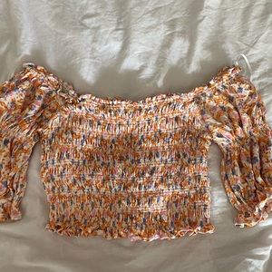 Urban Outfitters cropped long sleeve orange floral top